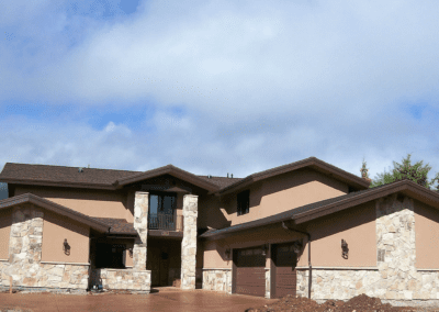 A home with a garage and a driveway.